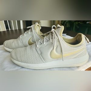 NIKE Women’s Roshe Two light bone and metallic gold athletic shoe. SIZE 9